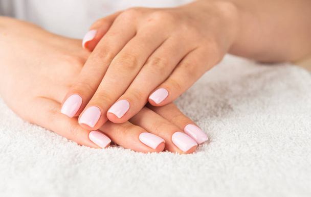  hands with light pink nail design - Foto, Imagen