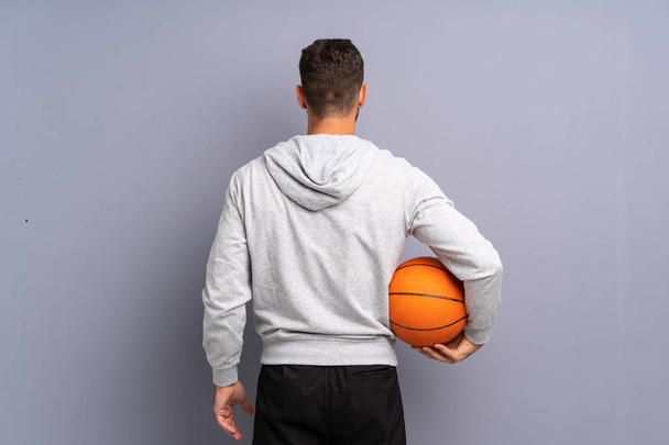 Handsome young basketball player man - Foto, imagen