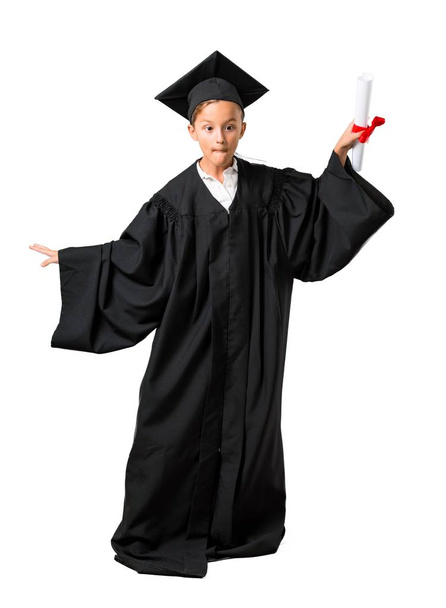 Full body of Little boy graduating listening to the music and dancing on isolated white background - Foto, immagini