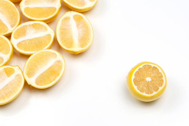 sliced lemons half on a light background - Fotoğraf, Görsel