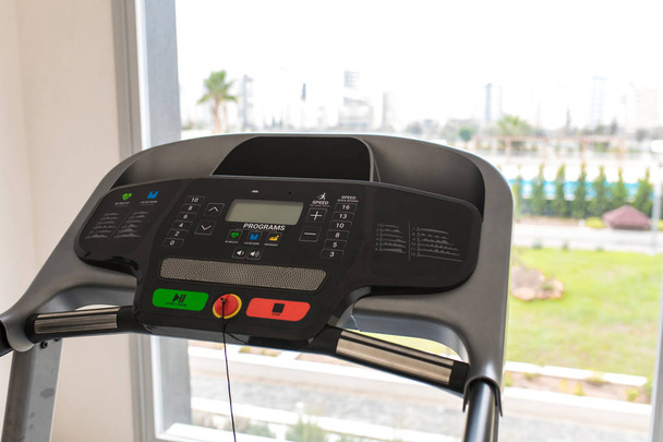Treadmill in Gym. Exercise equipments. Apartment gym studio saloon. - Фото, изображение