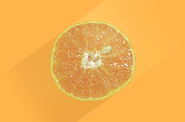 Оранжевий плід, нарізаний
 - Фото, зображення