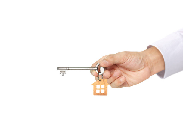 Real estate agent handing over house keys  - 写真・画像