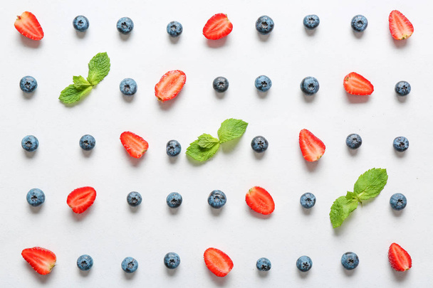 Many sweet ripe berries on white background - Zdjęcie, obraz