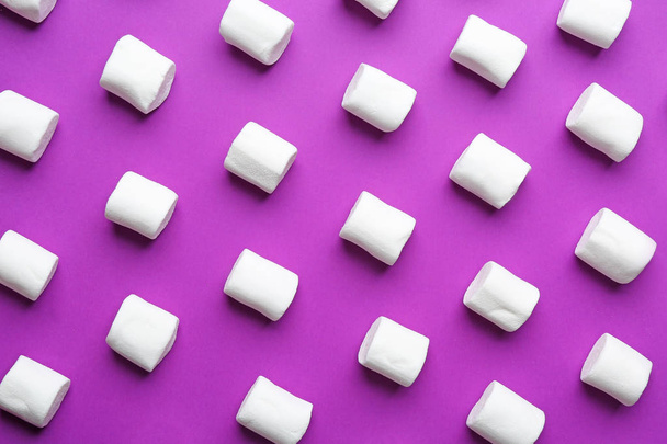 Many tasty marshmallows on color background - Photo, image