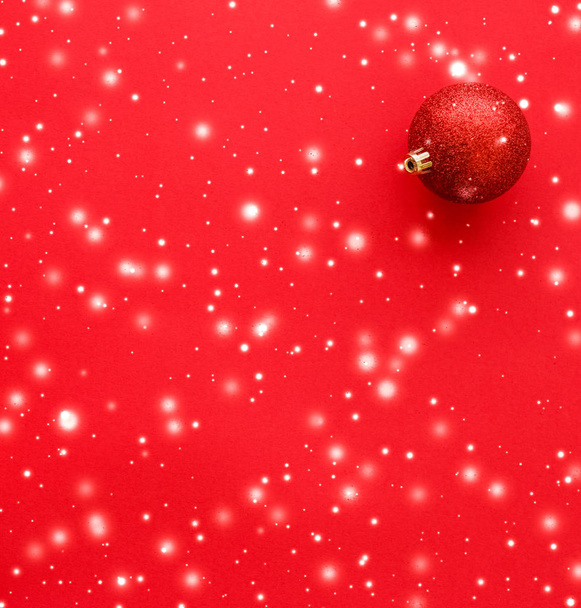Christmas baubles on red background with snow glitter, luxury wi - Fotoğraf, Görsel