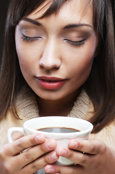 Woman with an aromatic coffee - Photo, Image