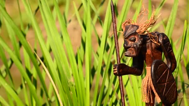 Figurine of an ancient warrior in nature - Footage, Video