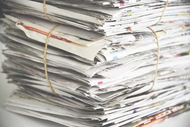 Pile of newspaper, background texture. Lots of retro journals with headlines, articles and photos - Фото, зображення
