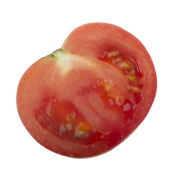 Closeup of tomato isolated on white background  - Fotó, kép