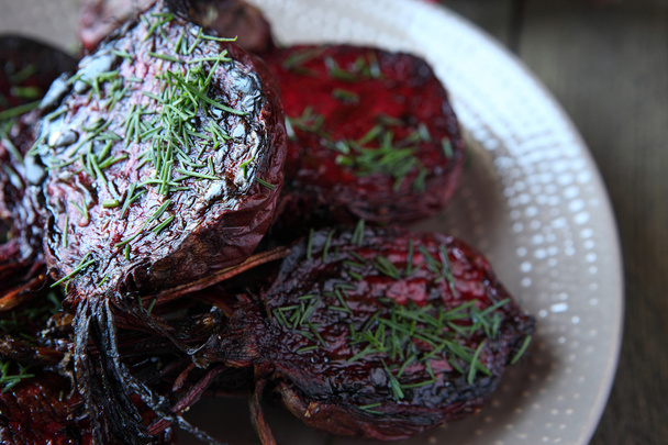 roasted halves of young beets with herbs - Photo, Image