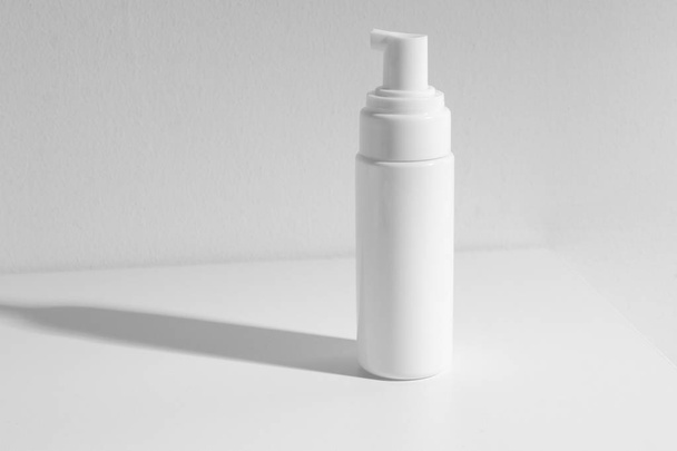 beauty spa medical skincare concept, cosmetic spray cream bottle packaging with white decor background table - Foto, imagen