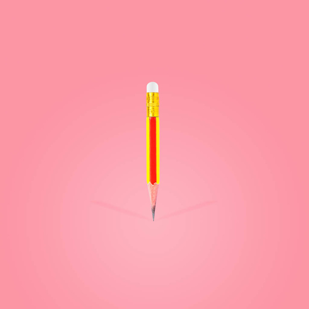 Short-sharpened wooden pencil and eraser isolated - Fotoğraf, Görsel