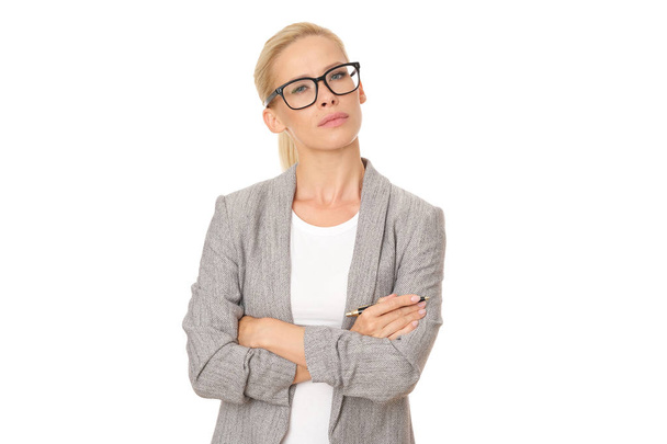 Business woman in grey jacket isolated on white background. - 写真・画像