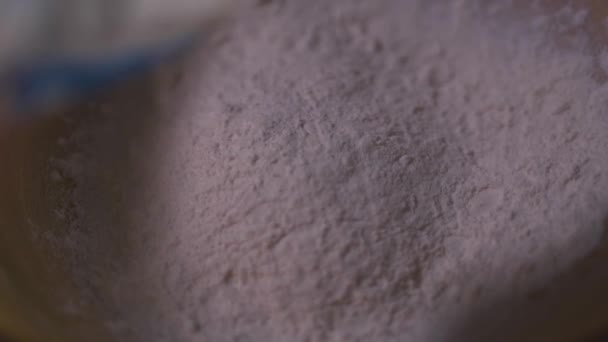 Flour pours out of the package. Close-up. Background. - Imágenes, Vídeo