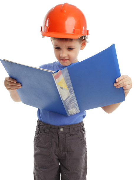 Child in a building helmet - Foto, immagini