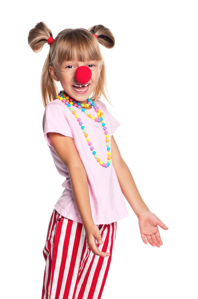 Little girl with clown nose - Фото, изображение