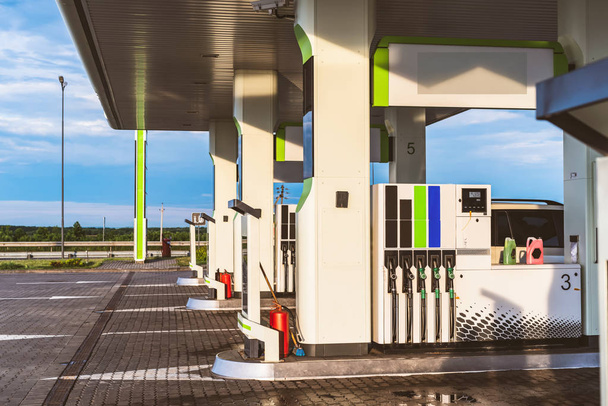Gas station with columns for fueling various fuel  - Fotoğraf, Görsel