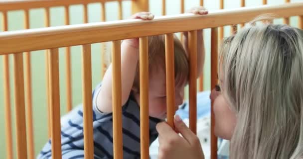 Baby is crying in the crib - Кадри, відео