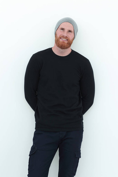 attractive male in black sweater and wool cap - Фото, зображення