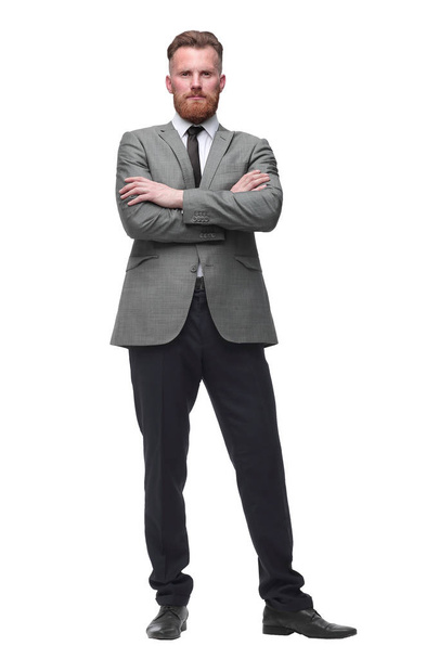 in full growth. portrait of a serious businessman . isolated on white - Φωτογραφία, εικόνα
