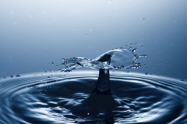 drop of water falling down in the water  - Foto, Imagem
