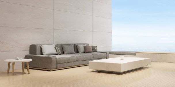 Szemszögéből modern luxus nappali szürke kanapé és az oldalsó asztal a tengerre néző háttér, minimális, travertin falon. -3D renderelés. - Fotó, kép