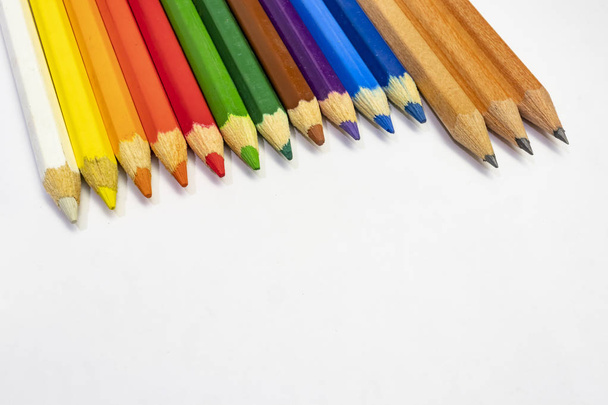 close up multi coloured pencils on white background. - Fotó, kép