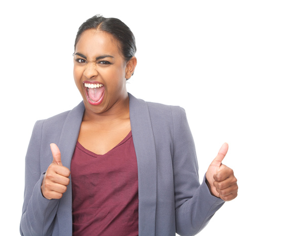 Successful young woman with thumbs up gesture - Photo, Image