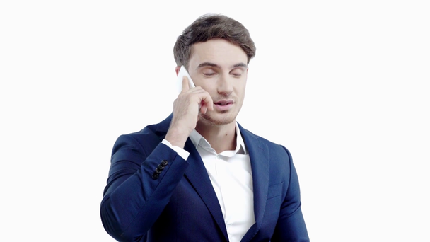 hombre de negocios hablando en el teléfono inteligente aislado en blanco
 - Imágenes, Vídeo