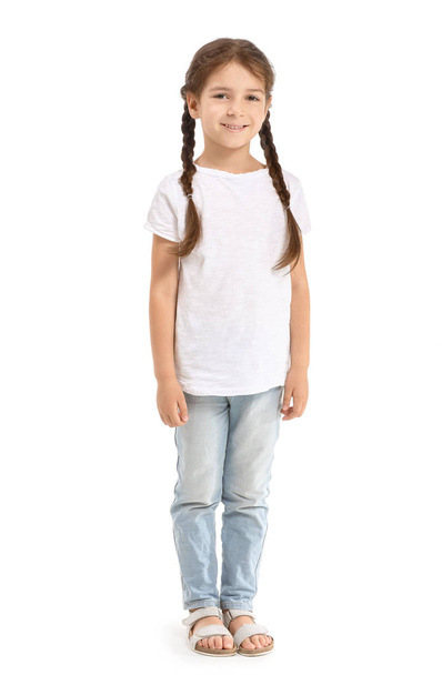 Little girl in stylish t-shirt on white background - Foto, Imagen