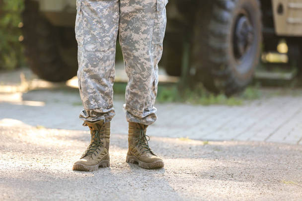 Male soldier in camouflage outdoors - Valokuva, kuva