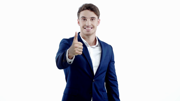 gelukkige zakenman toont duim omhoog geïsoleerd op wit - Video
