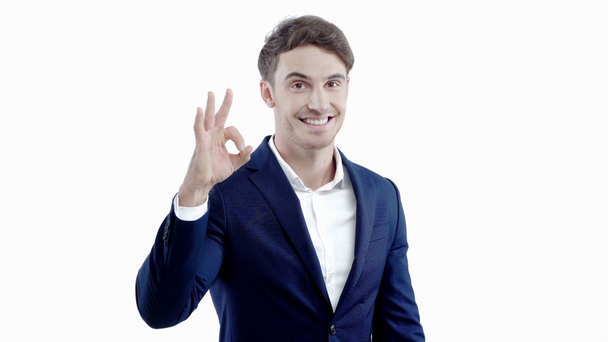 happy businessman showing okay sign isolated on white - Materiał filmowy, wideo