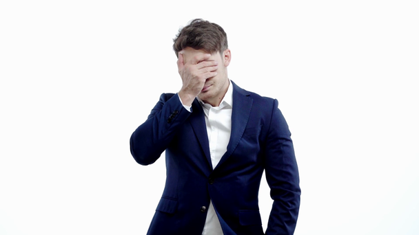 upset businessman showing facepalm isolated on white - Séquence, vidéo