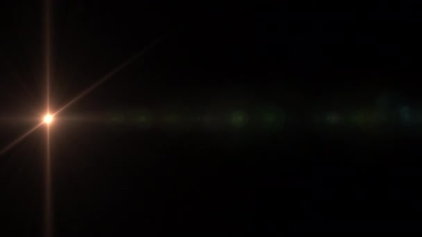 Abstract natuur lichteffect. Digitale lens flare op donkere achtergrond 4k-resolutie. - Video