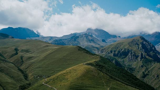 View of Kazbegi, Georgia. Beautiful natural mountain background - 写真・画像
