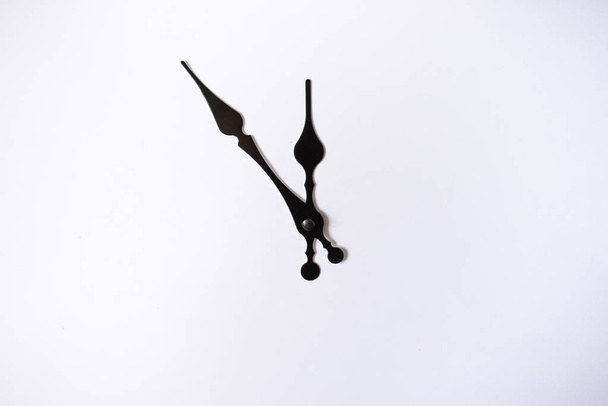 clock hands silhouette on a white background - Foto, Imagem