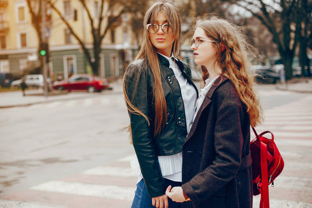 two stylish girl in a city - Foto, Imagem