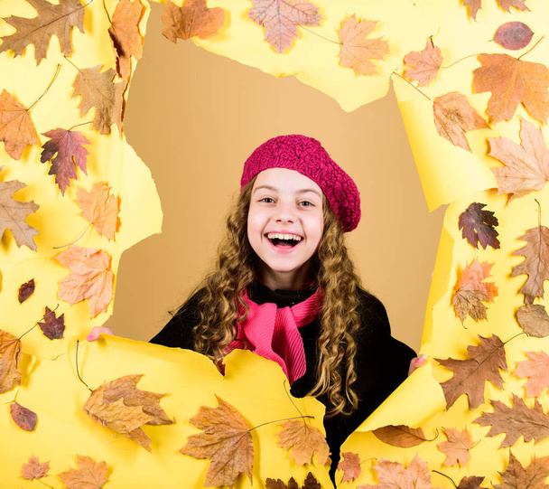 little girl in french beret. Fall fashion. parisian kid in autumn leaves. autumn beauty. Happy childhood. child in positive mood. little girl in trendy coat red scarf. Small child with autumn leaves - Photo, image