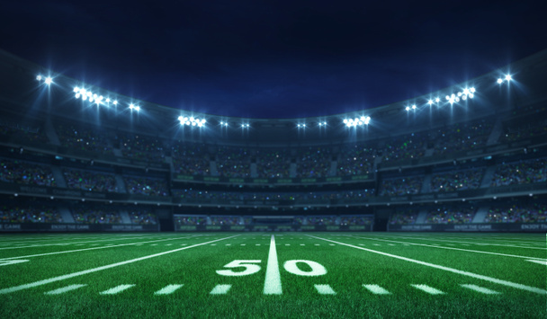 Stadion piłkarski ligi amerykańskiej z białymi liniami i wentylatorami, podświetlany widok z boku w nocy - Zdjęcie, obraz