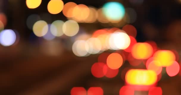The lights of the night city. Defocused movement of cars on a busy highway - Footage, Video