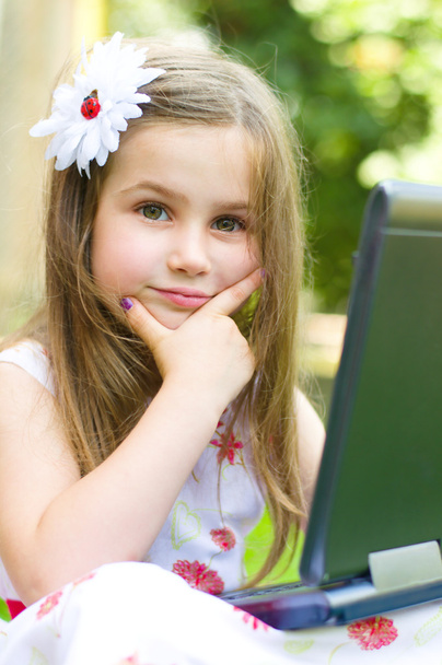 girl using her laptop outdoor - Фото, изображение