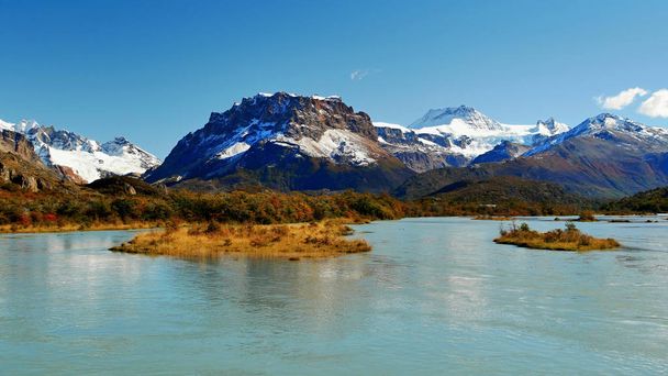 Reflection of mountains in a lake in Patagonia, Argentina. Andy mountains. - Photo, Image