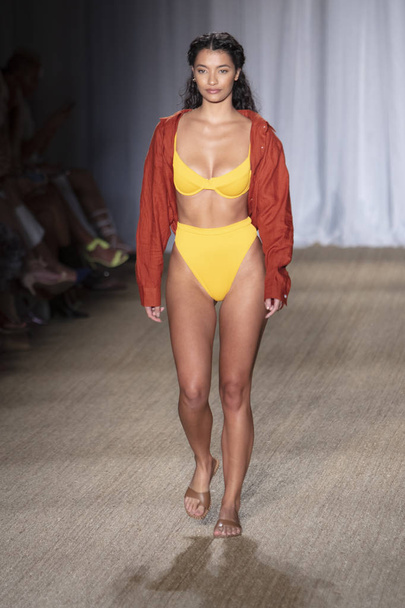 A model walks the runway for Monday Swimwear Summer collection 2020 fashion show during Paraiso Swim Week 2019 at Miami Beach in the Paraiso Runway Tent on July 12th, 2019 - Photo, Image