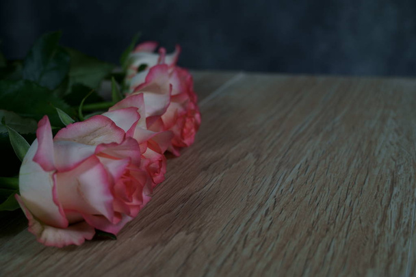 dolce vita rose on wood with gray background - Photo, Image