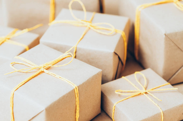 gift delivery service beige boxes yellow cord - Foto, Imagen