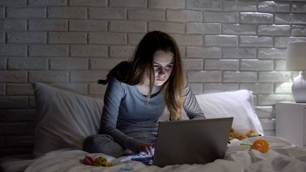 Exhausted mother searching tips for young parents in internet, falling asleep - Valokuva, kuva