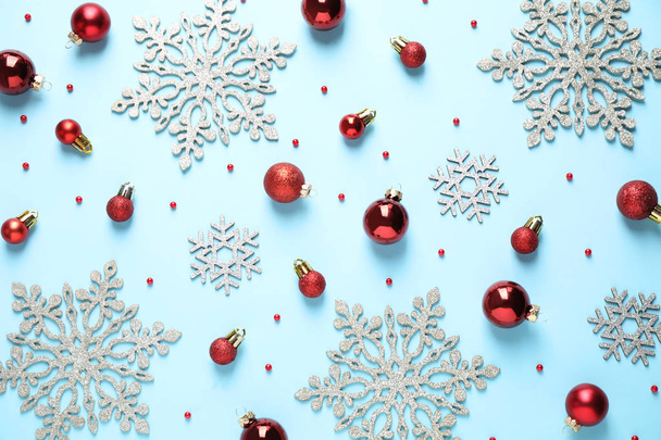 Flat lay composition with Christmas decorations on light blue background - Photo, Image