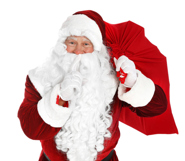 Authentic Santa Claus with bag full of gifts on white background - Fotografie, Obrázek